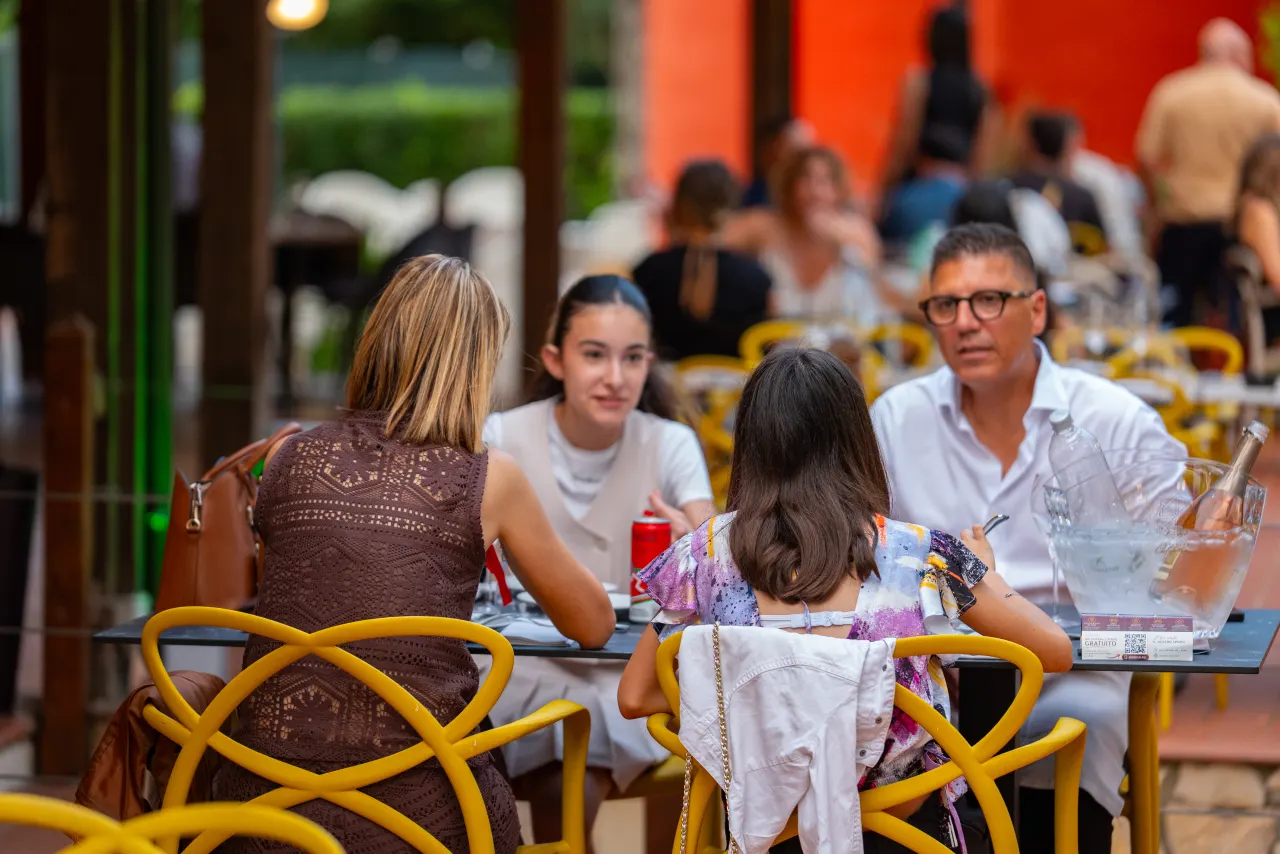 Guests at the table during the dinner event